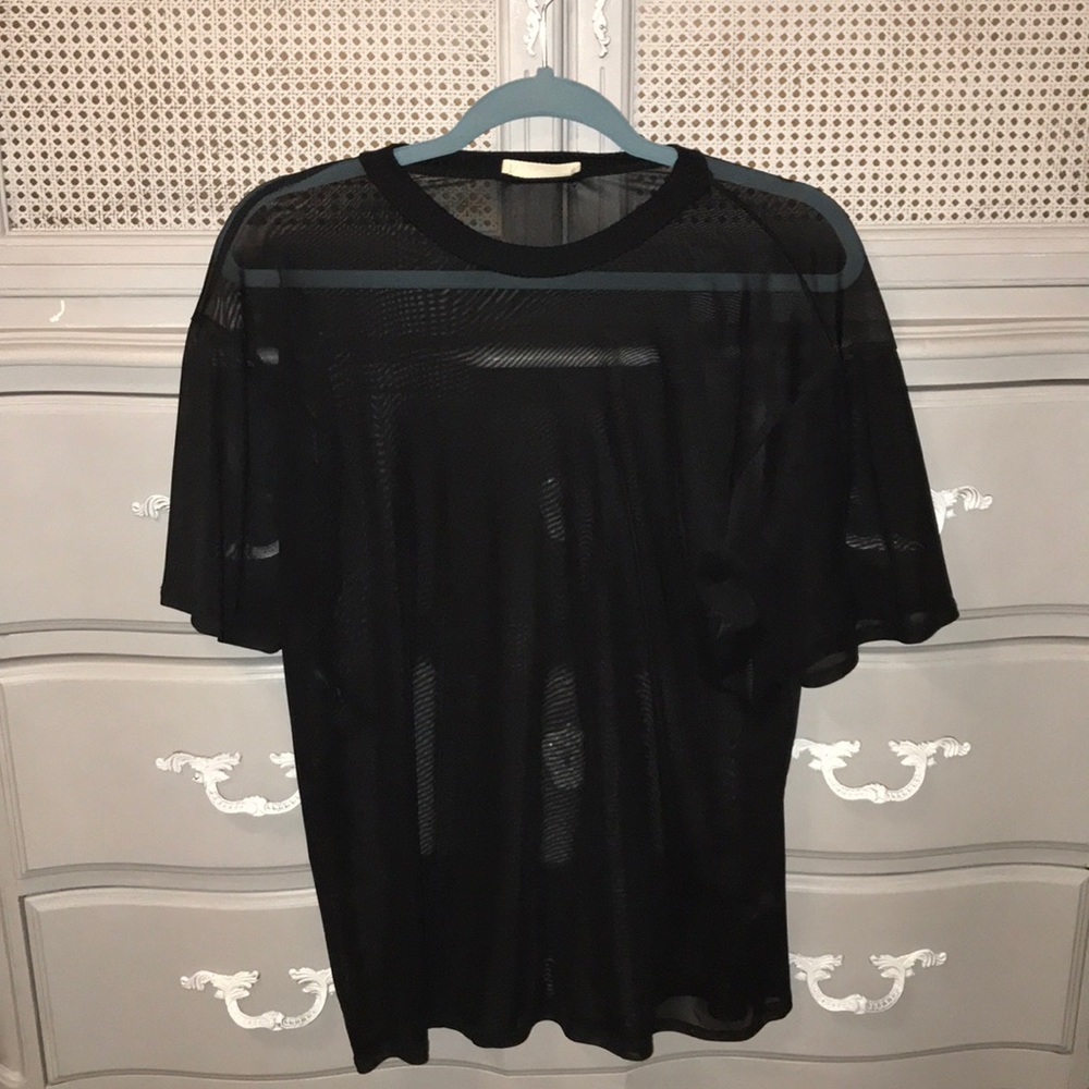Black blouse, shirt. See through